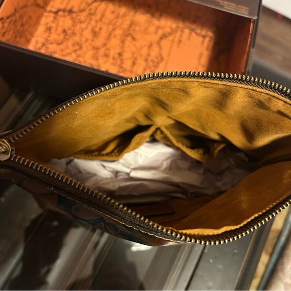 Brand New Patricia Nash fold over leather wristlet (still in & attached to box)
